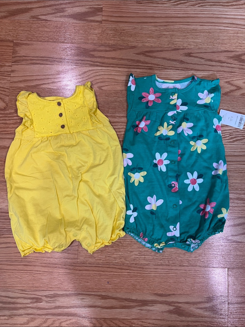 2 Carter’s Rompers